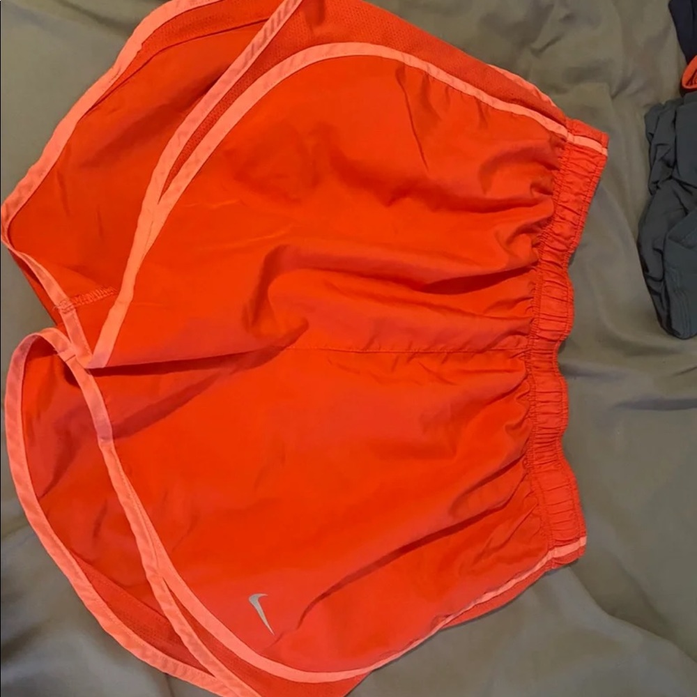 Orange Nike shorts